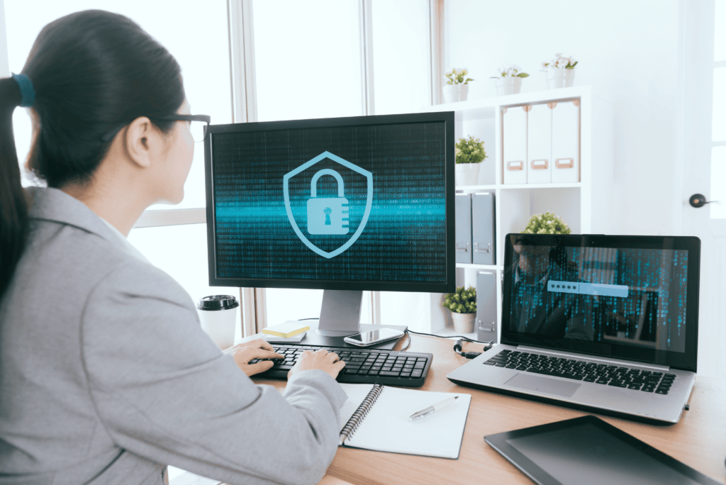 Woman at a computer with a lockscreen on.